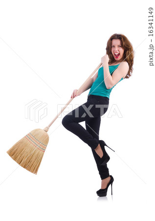 Young woman with broom isolated on white Young woman with broom isolated on white 16341149
