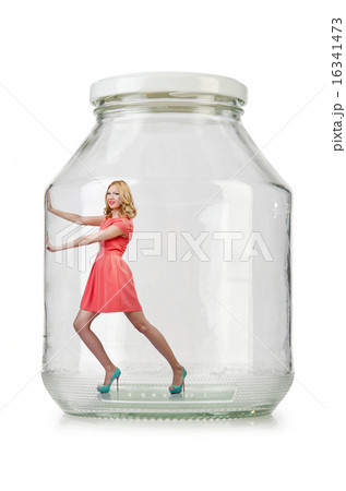 Woman in glass jar isolated on white Woman in glass jar isolated on white 16341473