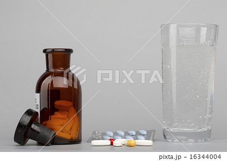 Various pills,medical bottle an glass of fizzy water Various pills,medical bottle an glass of fizzy water 16344004