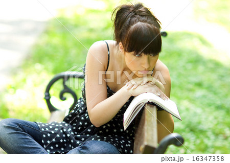 sad girl with book sad girl with book 16347358