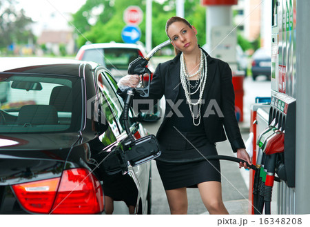 woman in gas station woman in gas station 16348208