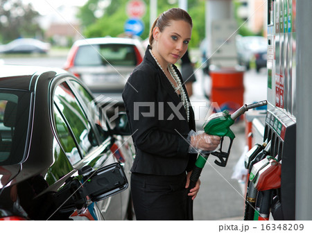 woman in gas station woman in gas station 16348209
