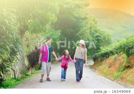 Asian family having evening walk 16349069