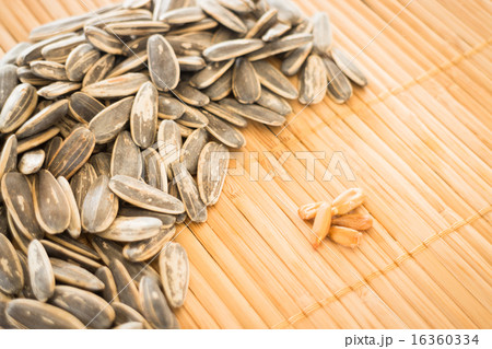 Sunflower seeds on kitchen mat Sunflower seeds on kitchen mat 16360334
