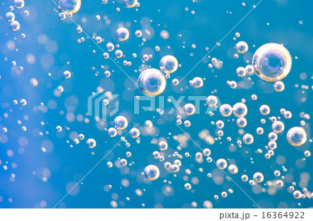 Macro Oxygen bubbles in water on blue background 16364922