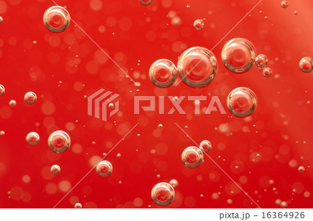 Air bubbles in a red liquid 16364926