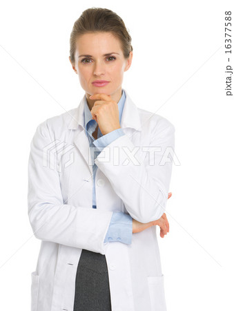 Portrait of thoughtful woman in white robe 16377588