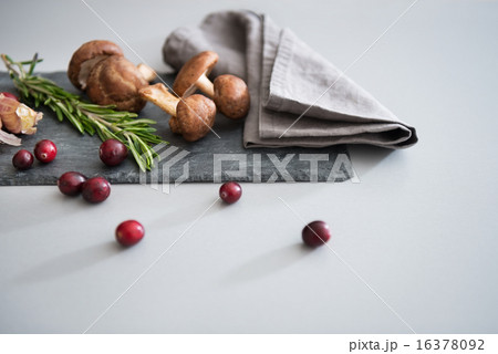 Mushrooms lingonberries and rosmarinus on table Mushrooms lingonberries and rosmarinus on table 16378092