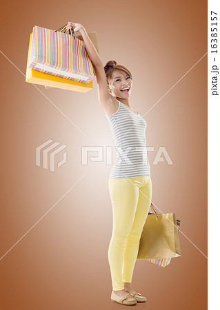 Cheerful shopping woman 16385157