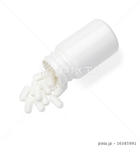 白い薬/白い容器からこぼれる錠剤 16385991