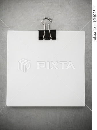 note paper and clip at metal background note paper and clip at metal background 16405314