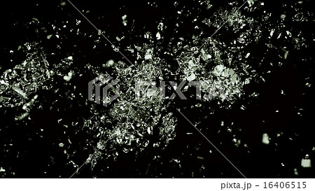 Broken or cracked glass on black background 16406515
