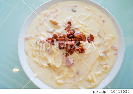 spaghetti carbonara sauce on glass background spaghetti carbonara sauce on glass background 16412036