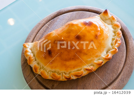 Pizza puff on the wood plate Pizza puff on the wood plate 16412039