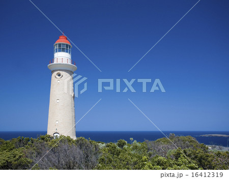 Lighthouse against clear blue sky Lighthouse against clear blue sky 16412319