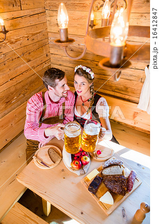 Couple having dinner at mountain hut in alps Couple having dinner at mountain hut in alps 16412847