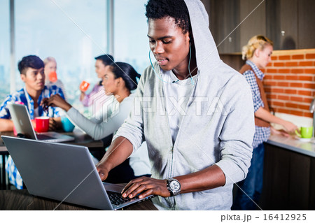 Black programmer in lounge of IT start-up 16412925