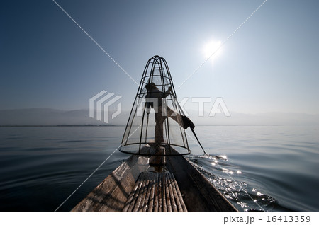 Burmese fisherman catching fish in traditional way Burmese fisherman catching fish in traditional way 16413359