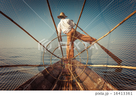Burmese fisherman catching fish in traditional way 16413361