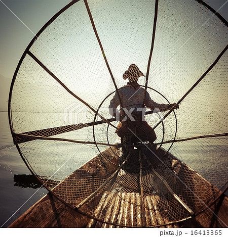 Burmese fisherman catching fish in traditional way 16413365
