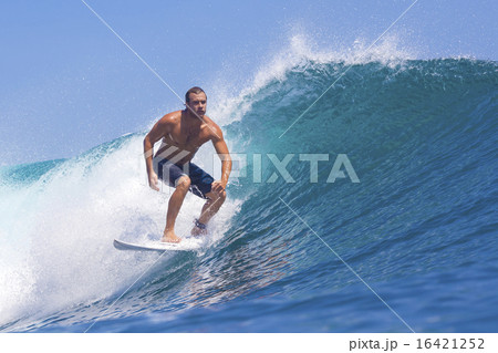 Surfer on Amazing Blue Wave Surfer on Amazing Blue Wave 16421252