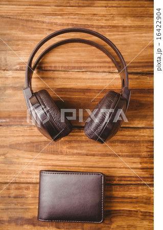 Music headphone next to wallet 16422904