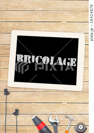 Bricolage against tools and tablet on wooden background Bricolage against tools and tablet on wooden background 16424879