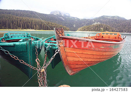 wooden boat on a mooring mountain lake 16427583