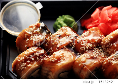 delivery service Japanese food rolls in plastic box 16432421