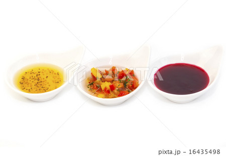 sauces on a white background in the restaurant 16435498