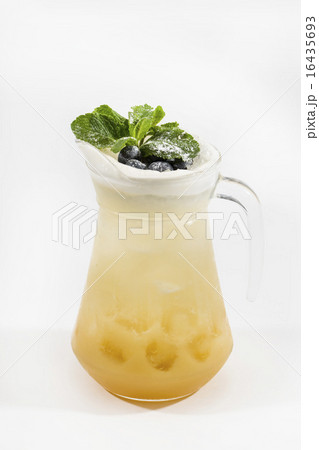 pitcher of lemonade closeup on white background pitcher of lemonade closeup on white background 16435693