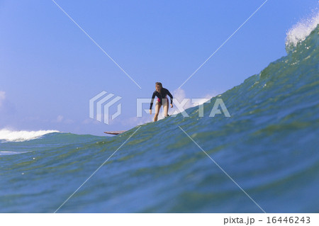 Surfer girl on Amazing Blue Wave 16446243
