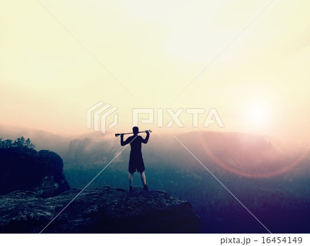 Tourist with poles in hands, melancholic morning. Tourist with poles in hands, melancholic morning. 16454149