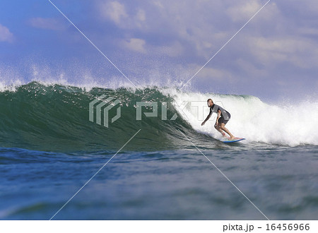 Surfer on Amazing Blue Wave 16456966