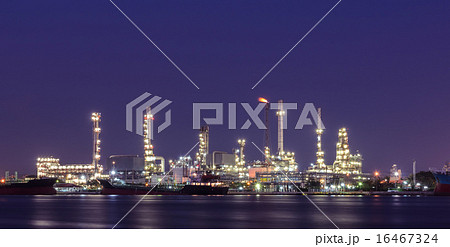 Oil refinery plant illuminated at twilight Oil refinery plant illuminated at twilight 16467324