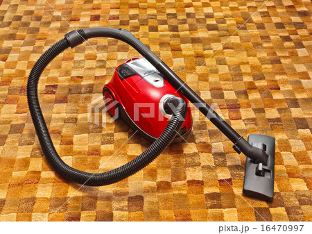 Vacuum cleaner on carpet 16470997