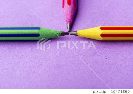 Colorful pencils on purple background Colorful pencils on purple background 16471869