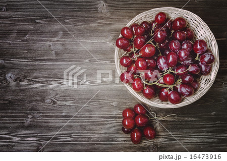 grapes in a wicker basket 16473916