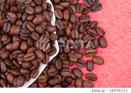 coffee beans on red cloth background coffee beans on red cloth background 16476722