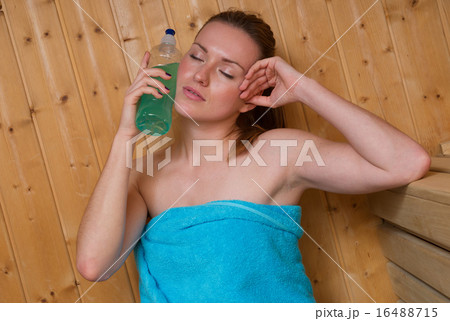 attractive woman sweating in sauna 16488715