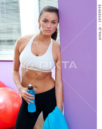 fit woman with energy drink fit woman with energy drink 16489648