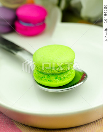 mini macarons on Spoon, Close up image mini macarons on Spoon, Close up image 16494286