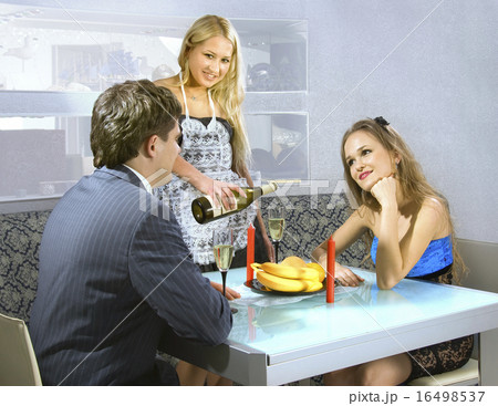 young courting couple and waitress 16498537