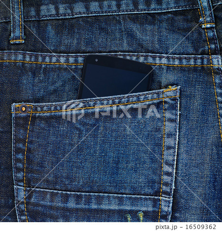 Smart phone in a back pocket of a jeans Smart phone in a back pocket of a jeans 16509362