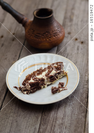 Piece of cake on the wooden table 16519472