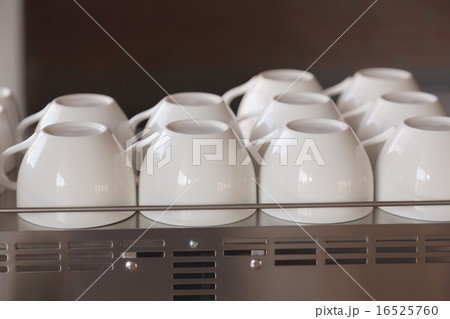 Empty coffee cup on coffee machine 16525760