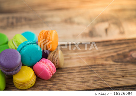 French colorful macarons on wood table 16526094