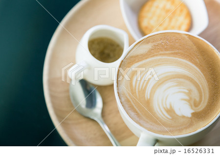 Hot latte art coffee on table ( Filtered image processed vintage Hot latte art coffee on table ( Filtered image processed vintage 16526331