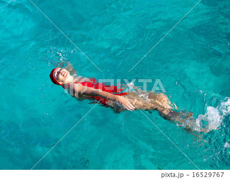 The sports girl swims in the sea The sports girl swims in the sea 16529767