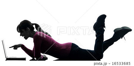 woman surprised pointing computing laptop computer silhouette 16533685